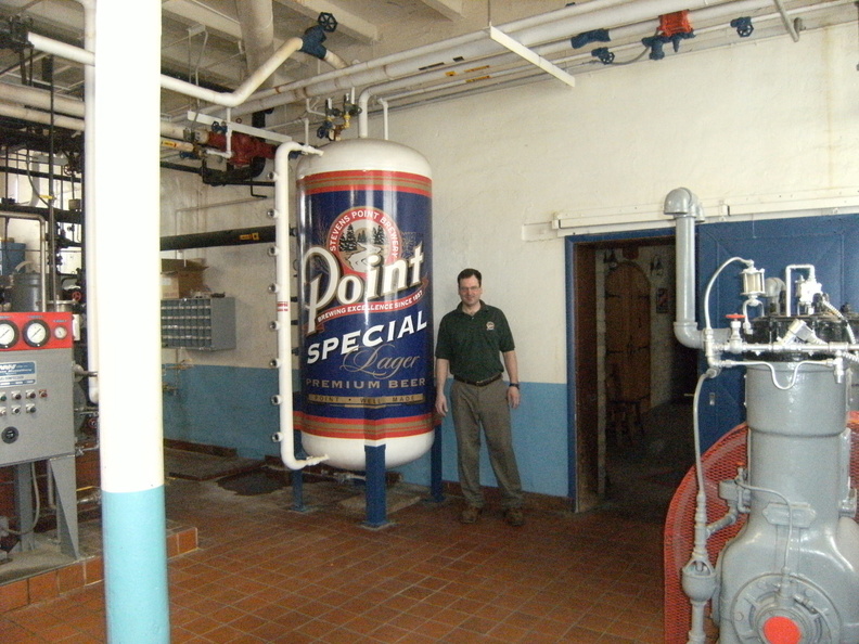 Brewer Brad in the 1872 built engine room next to the amonnia holding tank for the cooling systems.