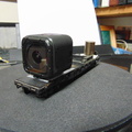 A new little GoPro camera on a flat car ready to operate.