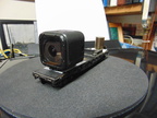 A new little GoPro camera on a flat car ready to operate.