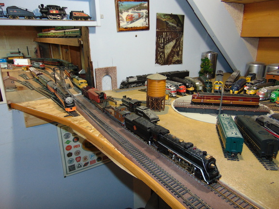 On the old model railroad, the main track going into the storage room staging track area.