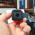 A GoPro brand high-tech waterproof video camera ready to use.