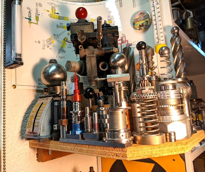 The whimsical one-of-a-kind Woodward governor parts and tooling display.