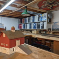 In the model railroad layout/office/reference library/engine governor room.