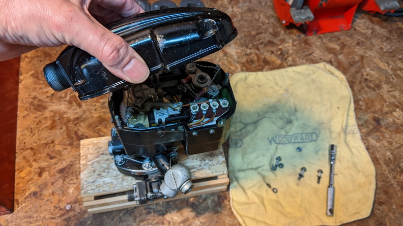 Opening up the electric head cover of the 79 year old constant speed control.