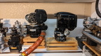 The Hamilton Standard double acting propeller engine governor next to the newest Hamilton Standard engine control.