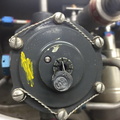 Top part of the Woodward 800 series fuel control governor unit.