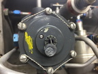 Top part of the Woodward 800 series fuel control governor unit.