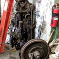 The top pulley connected from the generator drive shaft to the 2 flyweights.