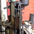 Closeup of the governor control stand showing the linkage to the pilot valve and compensating dashpot system.