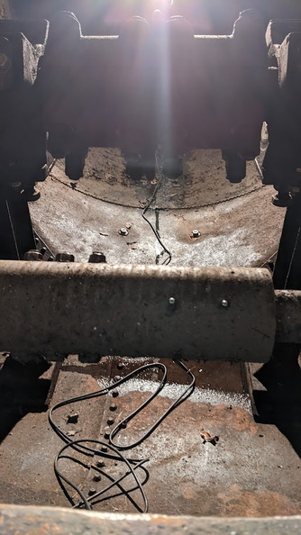 Showing the original gate shaft disconnected when the unit was upgraded.