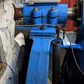 The main turbine drive shaft on the left side of the unit.