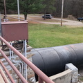Showing the trash racks going into the penstock at the right.