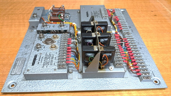 This 2nd generation 2301 series control board would have been inside an electrical cabinet for the engine and generator set.