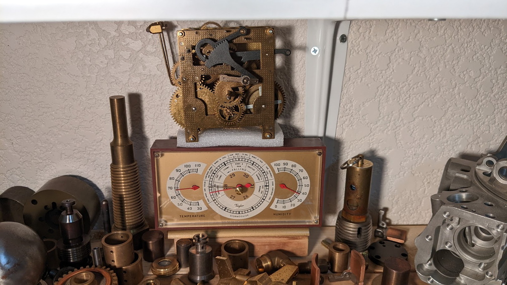 The timekeeping elements from a vintage chiming wall clock in the collection.