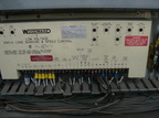 Closeup of the Woodward 2301A Load Sharing & Speed Control Unit.