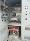 An electrical engine generator cabinet control unit equipped with Woodward controls.