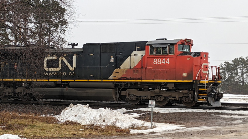 An EMD (Electro Motive Division) SD70M-2 diesel locomotive waiting to enter the main yard.