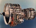 A CFM factory photo of the CFM56-2 gas turbine engine.  Location of the Woodward fuel control is on the bottom right.  The large silver can like unit is the MEC.
