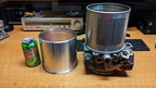 Aluminum cylindrical cases in the collection.