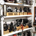 Several small Woodward Aircraft engine governors on display in the home office.