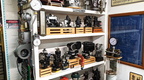Several small Woodward Aircraft engine governors on display in the home office.