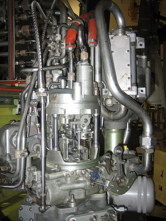 A Woodward GE CF6 fuel control with the protective cover removed to show the inside.