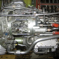 A Woodward CF6-50 series gas turbine fuel control with the cover removed on display in a museum.