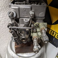 A Bendix aircraft engine fuel control for small gas turbines on display.