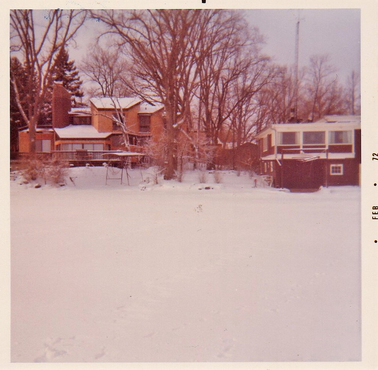 On the left is Brad's Madison childhood home built 53 years ago (at 1826 Camelot Drive).