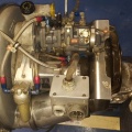 A Boeing model 502 - T50 gas turbine engine with a Woodward fuel control unit.