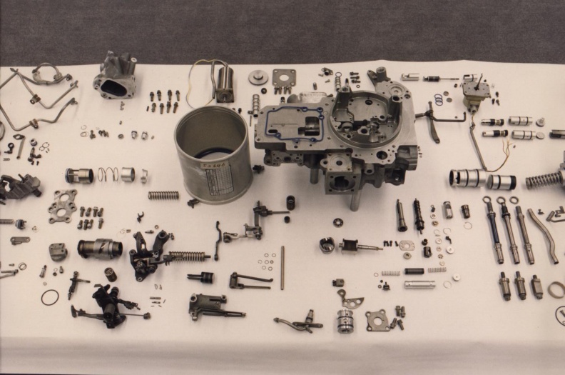 Components on display of a Woodward manufactured GE CF6-80C series jet engine fuel control (MEC).