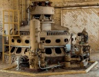 An abandoned Woodward Type HR Turbine Water Wheel Governor.