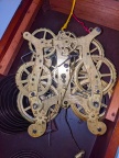 An 1886 brass clock gear set.