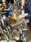 Closeup of a Woodward gas turbine fuel control for the Solar Company's portable gas turbine engine generator 