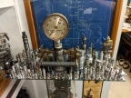 On the wall is a 1923 Woodward blueprint of a Woodward type D turbine water wheel governor application.