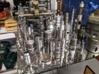 These are all very tight tolerance machined fuel control parts that go into Woodward aircraft engine governors.