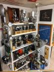 Added a whimsical glass mirror shelf display with massive amounts of old Woodward governor parts on it for shits & giggles.