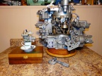 The smallest Woodward type 2419 gas turbine "tea cup" governor next to the largest Woodward type 3556 gas turbine governor in the collection.