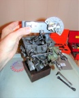 Removing the upper housing to view the inside components.
