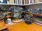 In the middle is a Woodward legacy type 1307 jet  engine fuel control designed and manufactured for the General Electric J79 engine.