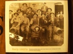 Brewery workers pose with their brew on the loading dock of the Stevens Point Brewery.