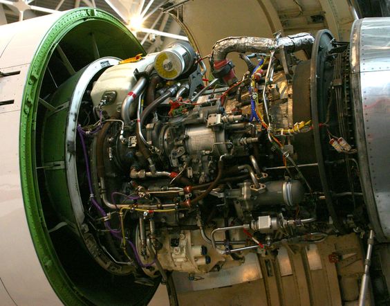 Series CFM56-3 jet engine with a Woodward MEC fuel control(silver can part in the center of the photo).