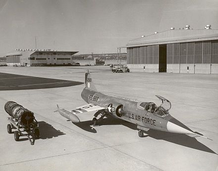 The newest 1960's fighter aircraft and the G.E. engine on display.