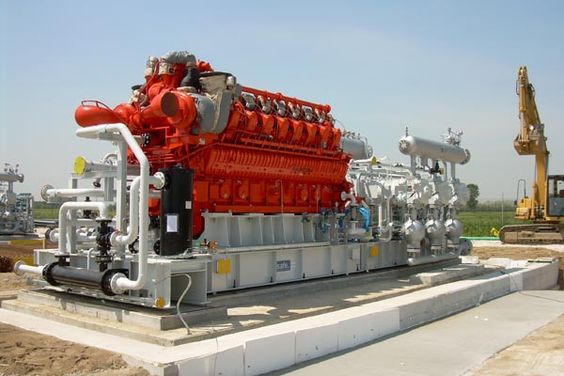 A diesel engine connected to a gas compressor.