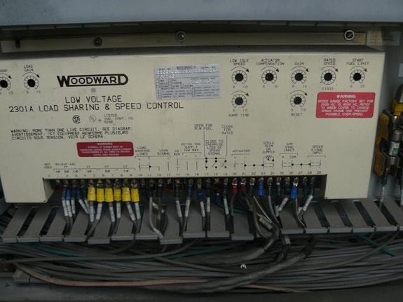 Closeup of the Woodward 2301A Load Sharing & Speed Control Unit.